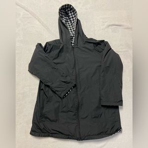 Reversible houndstooth rain jacket